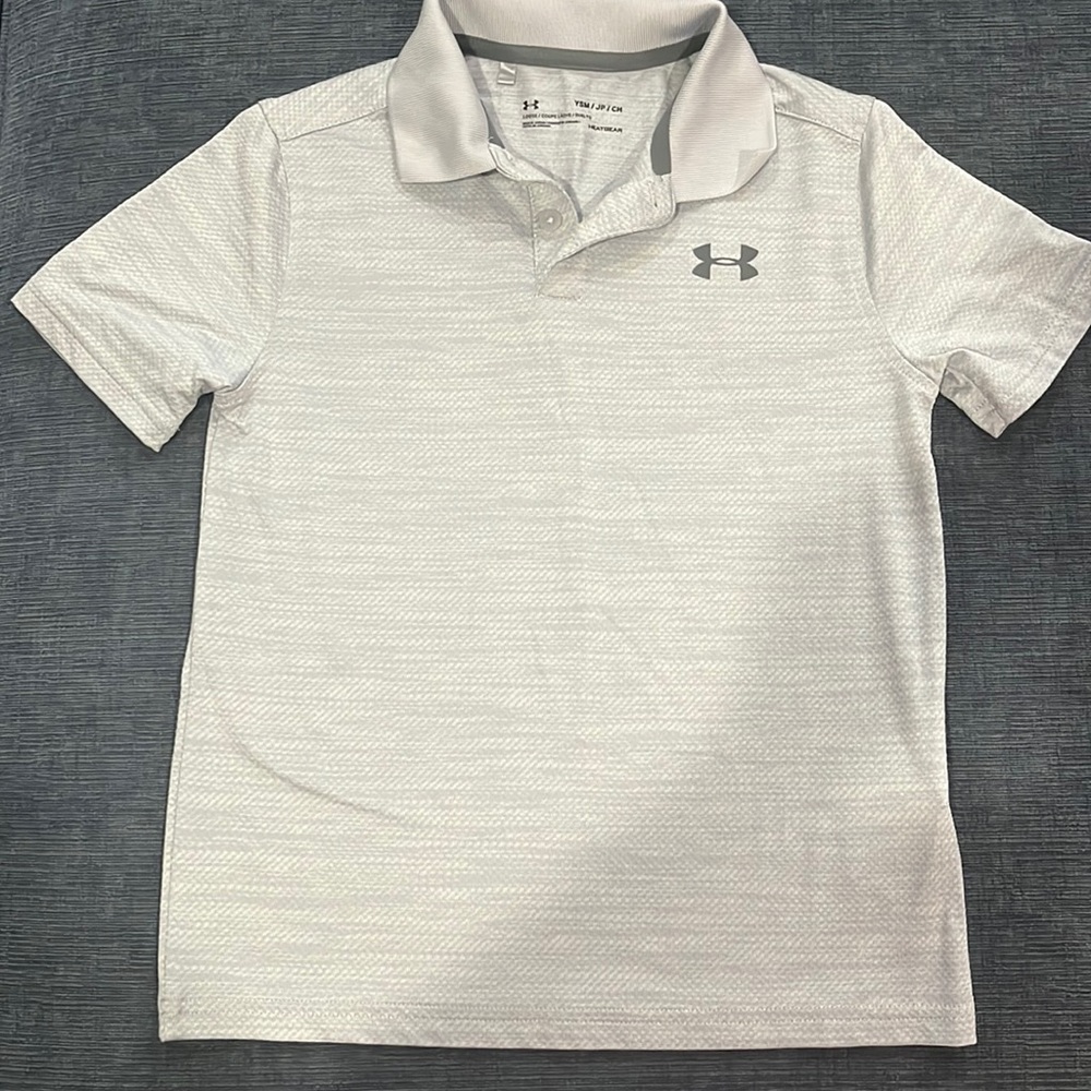 Boys Under Armour Golf shirt. Size Youth Small. Worn twice. No stains